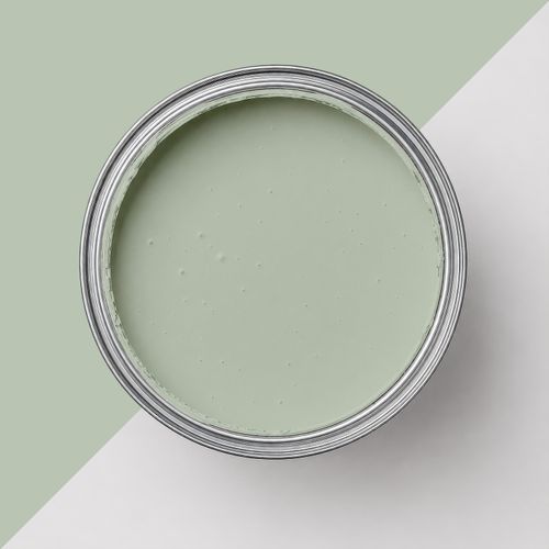 Geöffnete Farbdose mit Farbe "Wiesengrün"